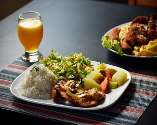 Traditional Costa Rican Casado dish with rice beans and salad